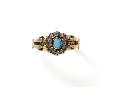 null Small ring in gold 750 and silver 800 thousandths, set with a turquoise cabochon...