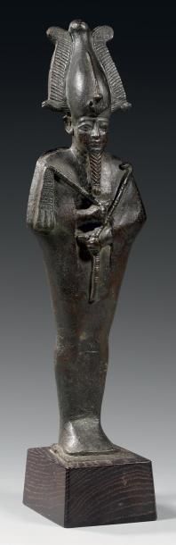 null Statuette représentant Osiris momiforme. Il porte le sceptre Heka et le flagellum...