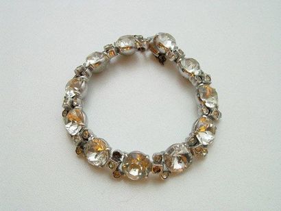 EISENBERG Elégant bracelet ligne en argent, orné de strass façon diamant en serti...