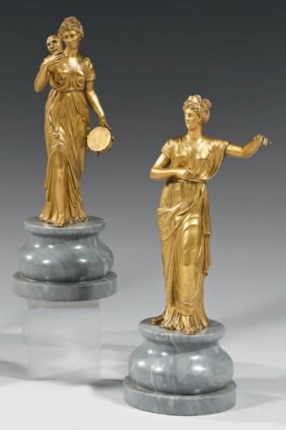  Paire de statuettes en bronze finement ciselé et doré à figurant deux allégories...