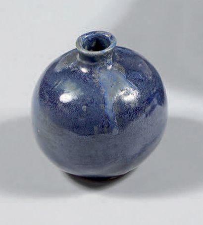 LANGLADE Jean (1879-1928) Small spherical ceramic vase with thick blue glazed pours....