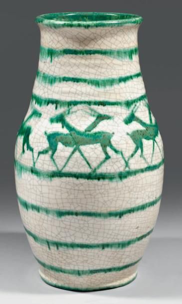 CAZAUX Édouard (1889 - 1 974) Grand vase piriforme allongé en grès. Décor d'antilopes,...
