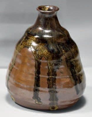 LENOBLE Emile (1902 - 1967) Vase piriforme en grès à coulées d'émaux brun à surface...