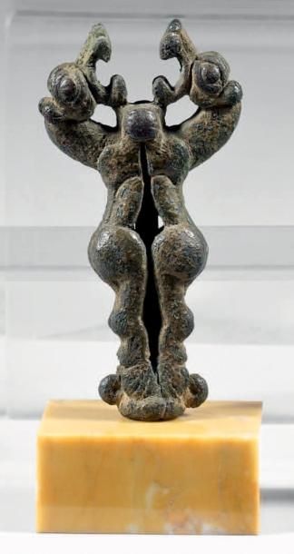 null Petite idole porte-épingle, présentant deux lions affrontés rugissants Bronze...