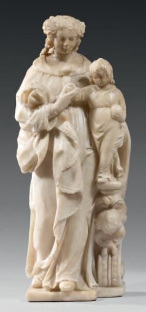null Vierge à l'Enfant en albâtre sculpté en rondebosse. La Vierge, debout, soutient...