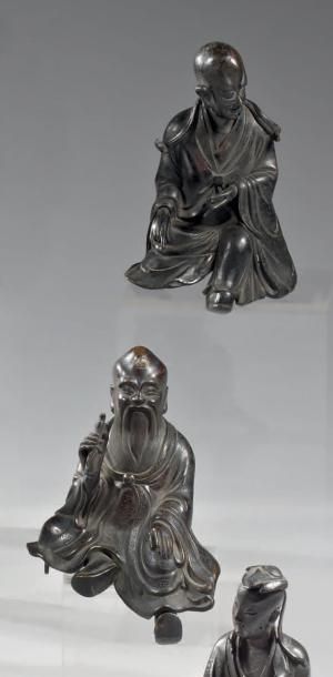 CHINE - XVIIIème siècle Deux statuettes de Laozi et immortel en bronze à patine brune....