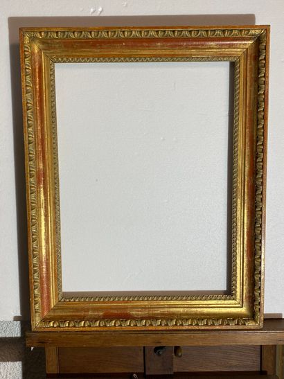 null A carved wood frame with antique gilding, 
Italy, early 19th century
63 x 46.5...