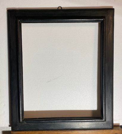 null A molded and blackened wooden frame with an inverted profile 
Italy, 17th-18th...