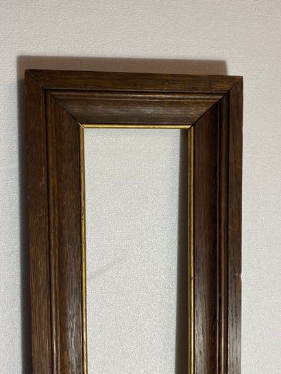 null A "entablature" frame in natural oak with mouldings and gilded rebates
Gothic...