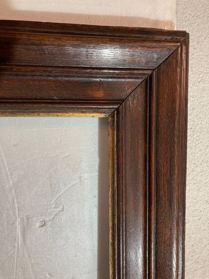 null A large molded natural wood frame with gilded foliage
19th century
71.5 x 53...