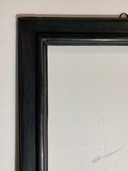 null A molded and blackened wooden frame with an inverted profile 
Italy, 17th-18th...