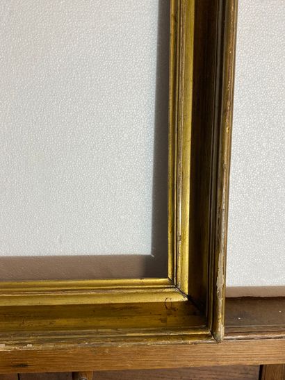 null A molded and gilded wooden hollow profile frame,
Italy, early 19th century
65...