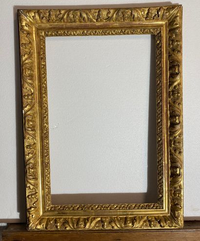 null A carved and gilded limewood frame decorated with an acanthus frieze
Louis XIII...