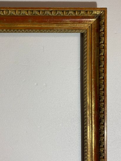 null A carved wood frame with antique gilding, 
Italy, early 19th century
63 x 46.5...