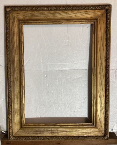 null A gilded patinated wood and stucco frame
circa 1900
58 x 39.5 x 10.5 cm
(sold...