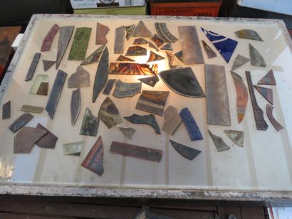 null Box containing approximately 174 stained glass scraps from different periods...