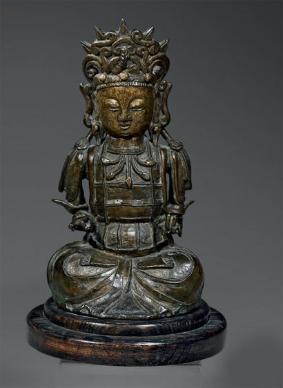 CHINE Figurine représentant un bouddha assis...