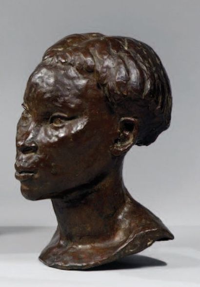 CHARDON « Buste de femme africaine ». Epreuve en bronze à patine brune, sans marque...