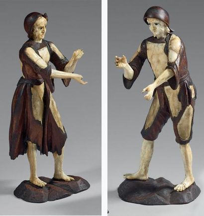 TROGGER (atelier de ou suiveur) Deux statuettes en ivoire sculpté, rehaussé de bois,...