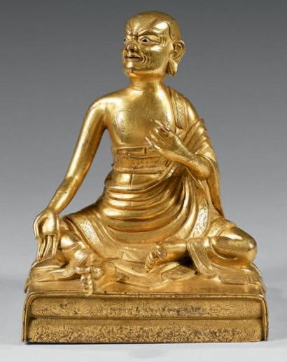 CHINE Art sino-thibétain Intéressante figurine en bronze doré, représentant un acète...