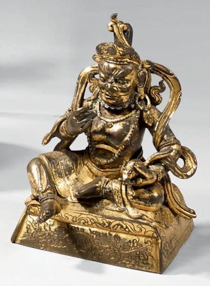 TIBET Statuette de Kubera en bronze doré, assis en raja-lilasana (délassement royal)...