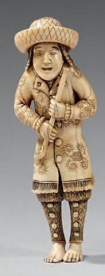 JAPON Netsuke en ivoire, Hollandais debout tenant une pipe. XIXème siècle H: 10,5...