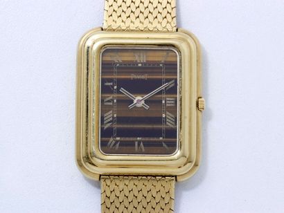 PIAGET Montre bracelet d'homme en or 18 K, cadran oeil de tigre avec chiffres romains...