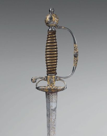 null Belle et très rare épée de cour:
Garde en acier ciselée et damasquinée à fonds...