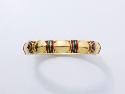 null Bracelet jonc rigide ouvrant en or 750 millièmes, décoré de motifs godronnés...
