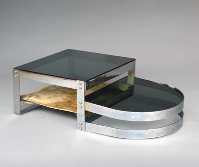 RIZZO Willy Table basse à armature en métal chromé à plateau central de forme carrée...