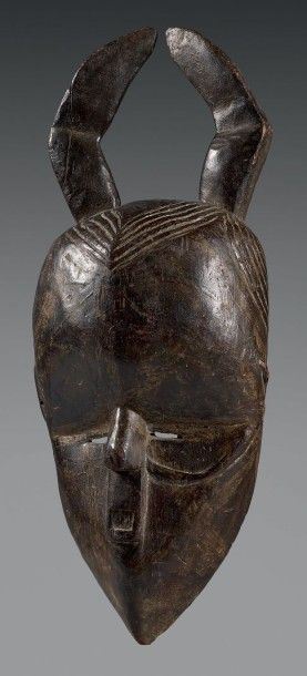 null GOURO / BETE (Côte-d'Ivoire)
Rare et ancien masque aux traits anthropomorphes...