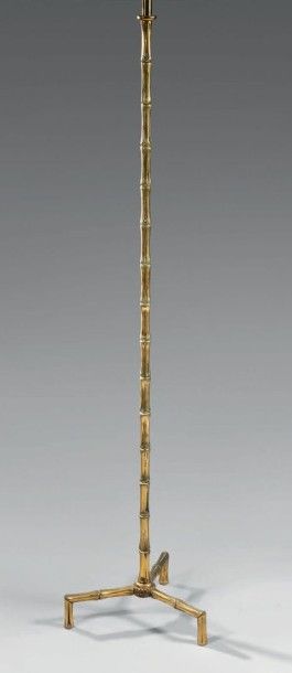 ADNET Jacques (1900 - 1984) Lampadaire façon bambou en bronze doré, piètement tripode.
Haut....