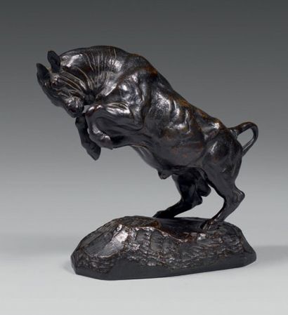 Antoine-Louis BARYE Statuette en bronze patiné repré­sentant un taureau se cabrant;...
