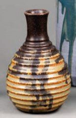 JEANNENEY Paul (1861-1920) Vase ovoïde à col cylindrique en grès à corps annelé à...