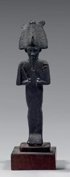null Statuette d'Osiris momiforme tenant le sceptre et le flagellum.
La barbe postiche...