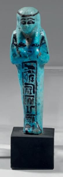 null Oushebti inscrit sur une colonne ventrale au nom d'Amon-Hat, père divin, prophète...