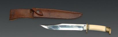Jean TANAZAQ Couteau de chasse à manche ivoire à bords festonnés, lame de 23,5 cm,...