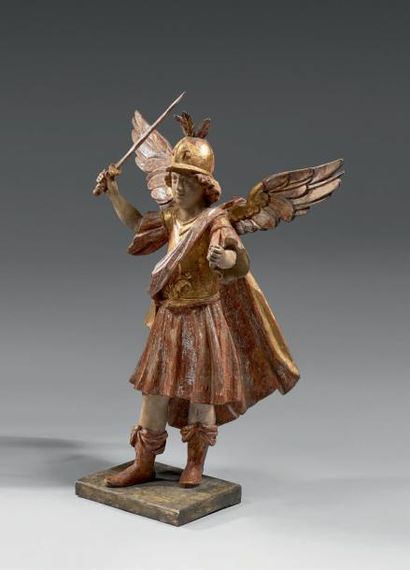 null Sculpture en bois sculpté polychrome argenté et doré figurant l'archange saint...