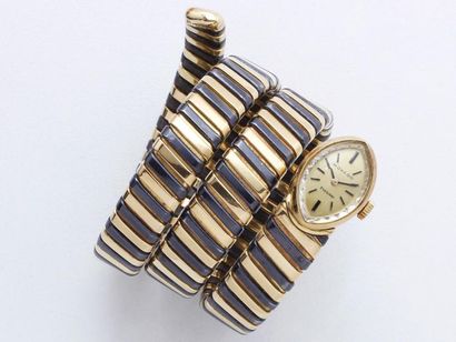 null BULGARI « MOVADO »
Montre bracelet de dame en or 750 millièmes, cadran doré...