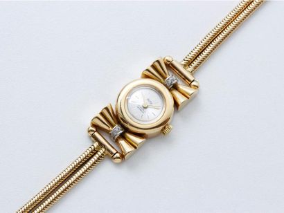 null Montre bracelet de dame en or 750 millièmes, cadran argenté rayonnant avec index...