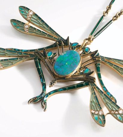 René LALIQUE Pendentif Art Nouveau en or 750 millièmes satiné, stylisant quatre libellules...