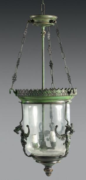 null Suite de quatre lanternes circulaires en bronze et métal patiné vert; les pourtours...