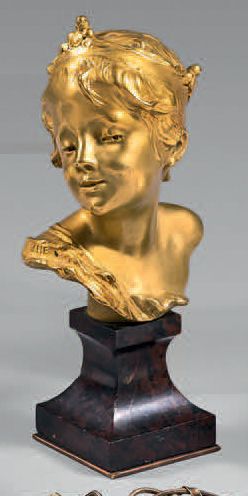 LARCHE Raoul (1860-1912) 
«Buste de jeune homme». Épreuve en bronze à patine dorée,...