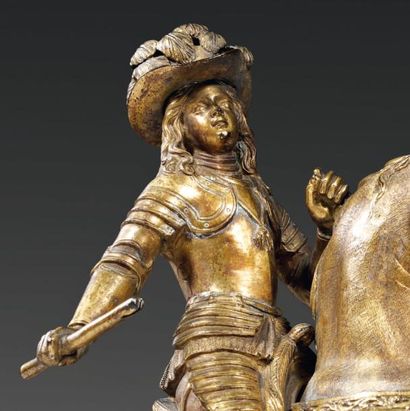 null Rare groupe en bronze très finement ciselé et doré, figurant un homme en armure,...