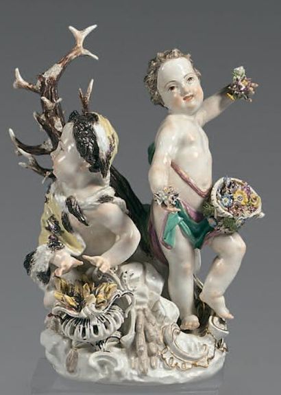 MEISSEN Groupe en porcelaine composé de deux enfants symbolisant l'Hiver et le Printemps,...