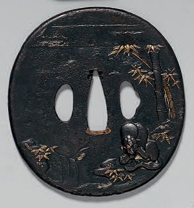 null TSUBA en fer à décor en relief d'un tigre et des bambous.
L: 9,1 cm
Japon, XIXème...