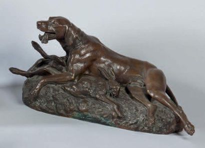 Émile Louis TRUFFOT (1843 - 1896) Chien gardant un lièvre
Bronze a patine brune nuancée,...