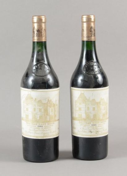 null 2 bouteilles CH. HAUT-BRION, 1° cru Pessac-Léognan 1986 (es, et)
