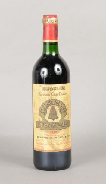 null 1 bouteille CH. ANGELUS, 1° Grand cru St-Emilion 1992 (es & elt, J)