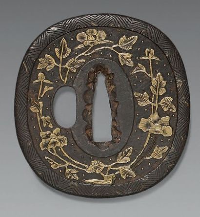 null Tsuba en fer a décor en Heianjo-zogan de fleurs et feuillages.
Epoque EDO (1603-1868)...